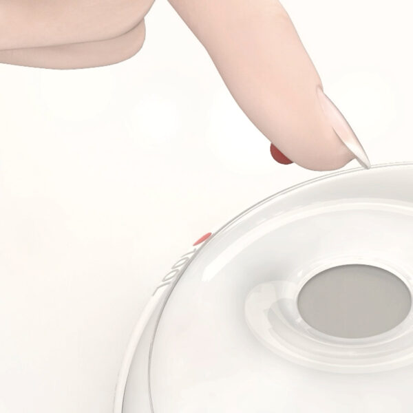 Finger with a blood drop approaching to a medical device.