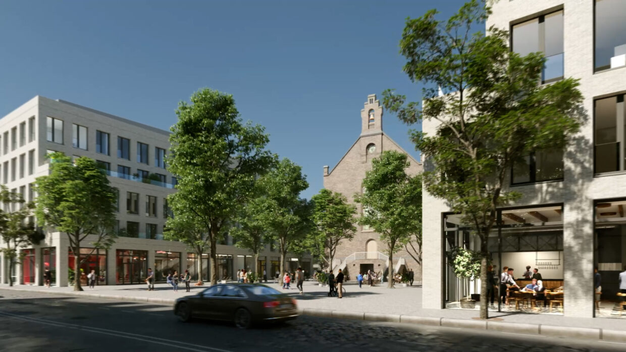 Old church in a lively urban area surrounded by new buildings.