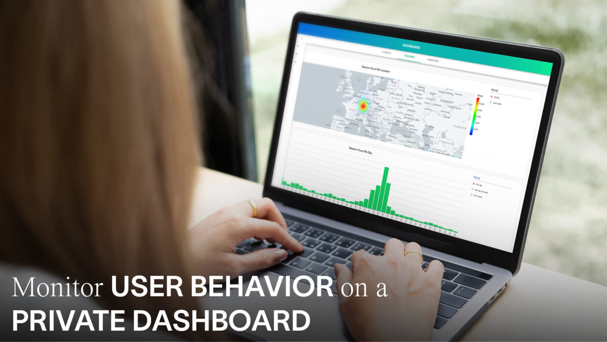 Close-up of a woman looking at a dashboard on a laptop screen, typing.